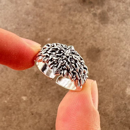 Men's ring with adjustable wide face opening